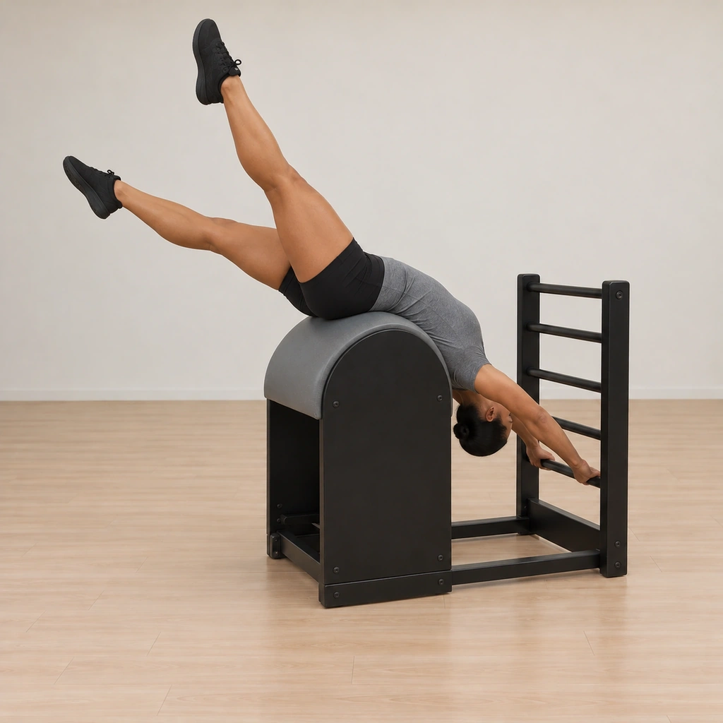 Her lifted legs are mid-circle - opening, sweeping up and around toward together above the barrel.