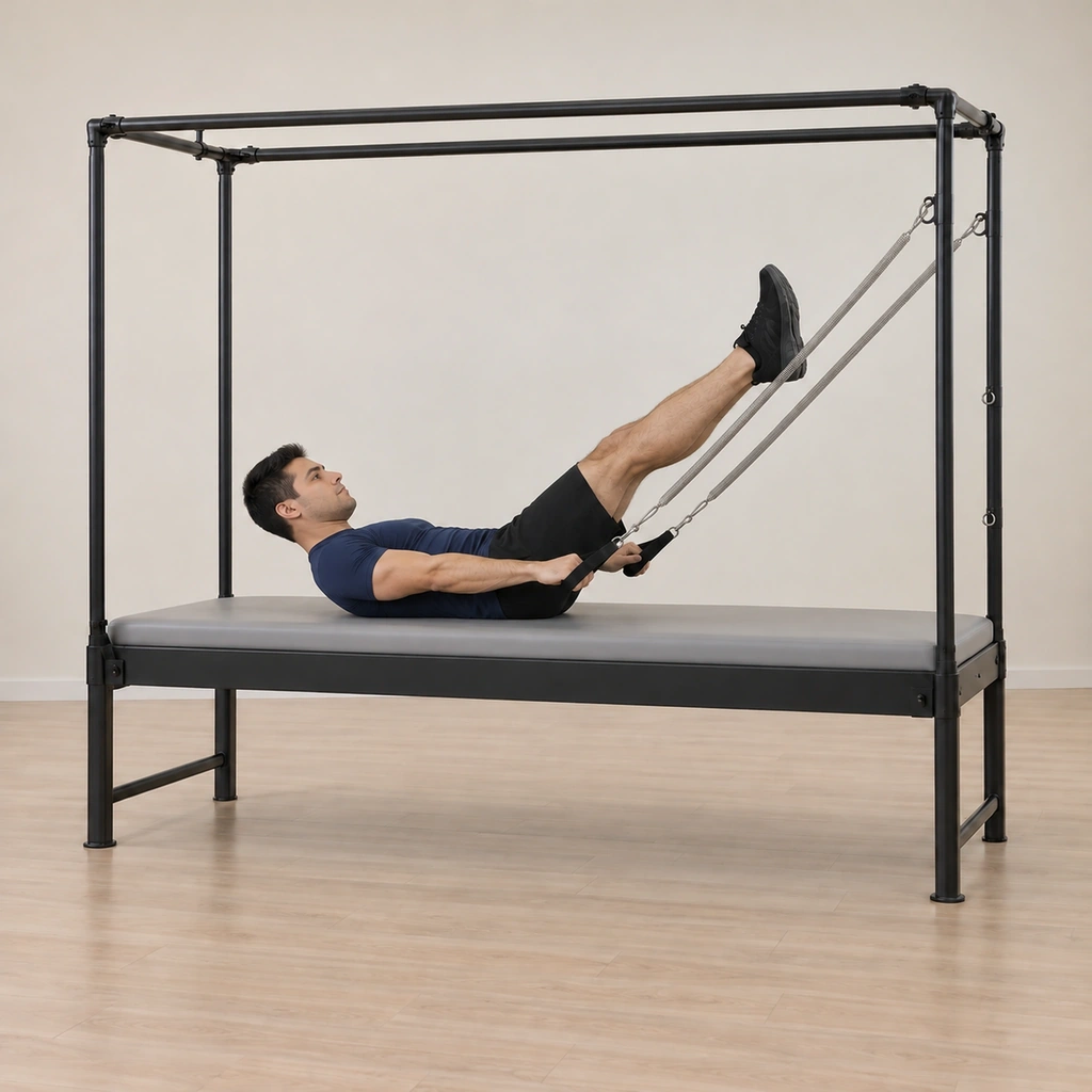 His legs have floated off the mat toward eye level while his arms pulse in a small pumping rhythm at hip height, his curl held at the same controlled height.