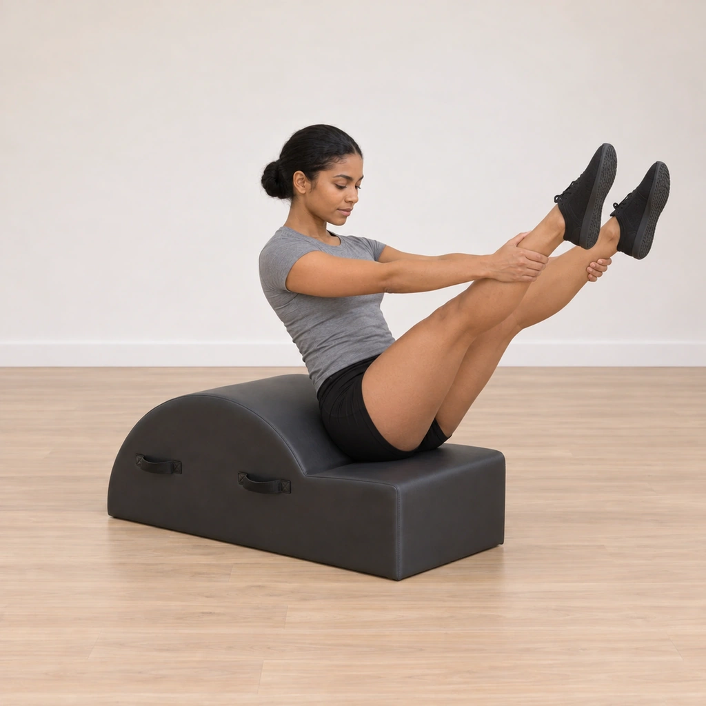 She is back balanced on the seat - the same extended-leg shape returned upright, the center re-stacked.