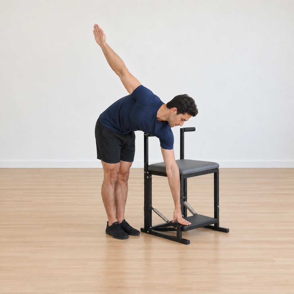The spring is closed under his straight inside arm, the pedal drawn down to its seat, his rounded spine holding the close while the outside arm stays circled up, ready to bend and release into the next round.