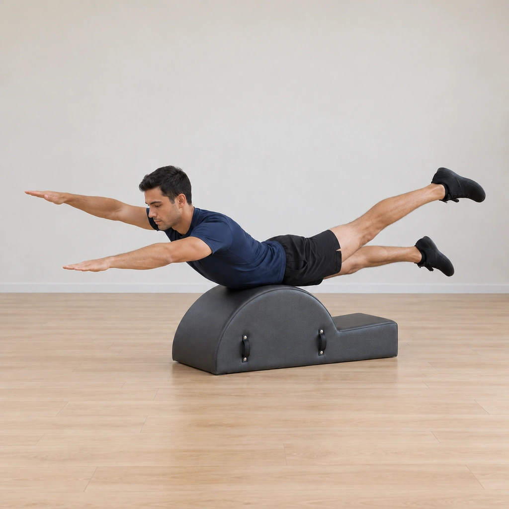 The man lifts his left leg and his right arm higher simultaneously while balancing on the arc apex, the right leg and left arm holding the extension line.